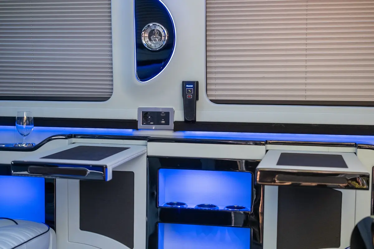 Ultra Lux Sprinter tables and passenger amenities